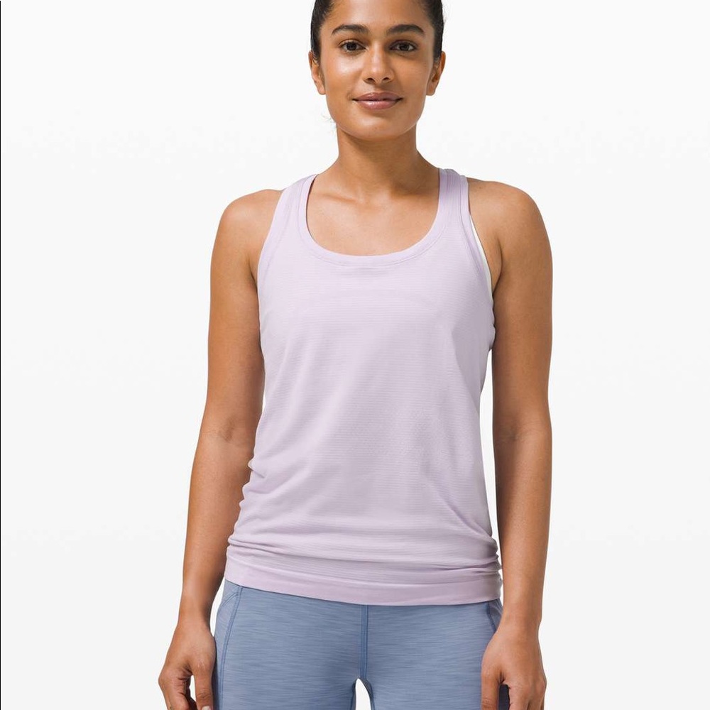 Lululemon size 4 lavender dew swiftly tank! Good condition ( no rips or stains)